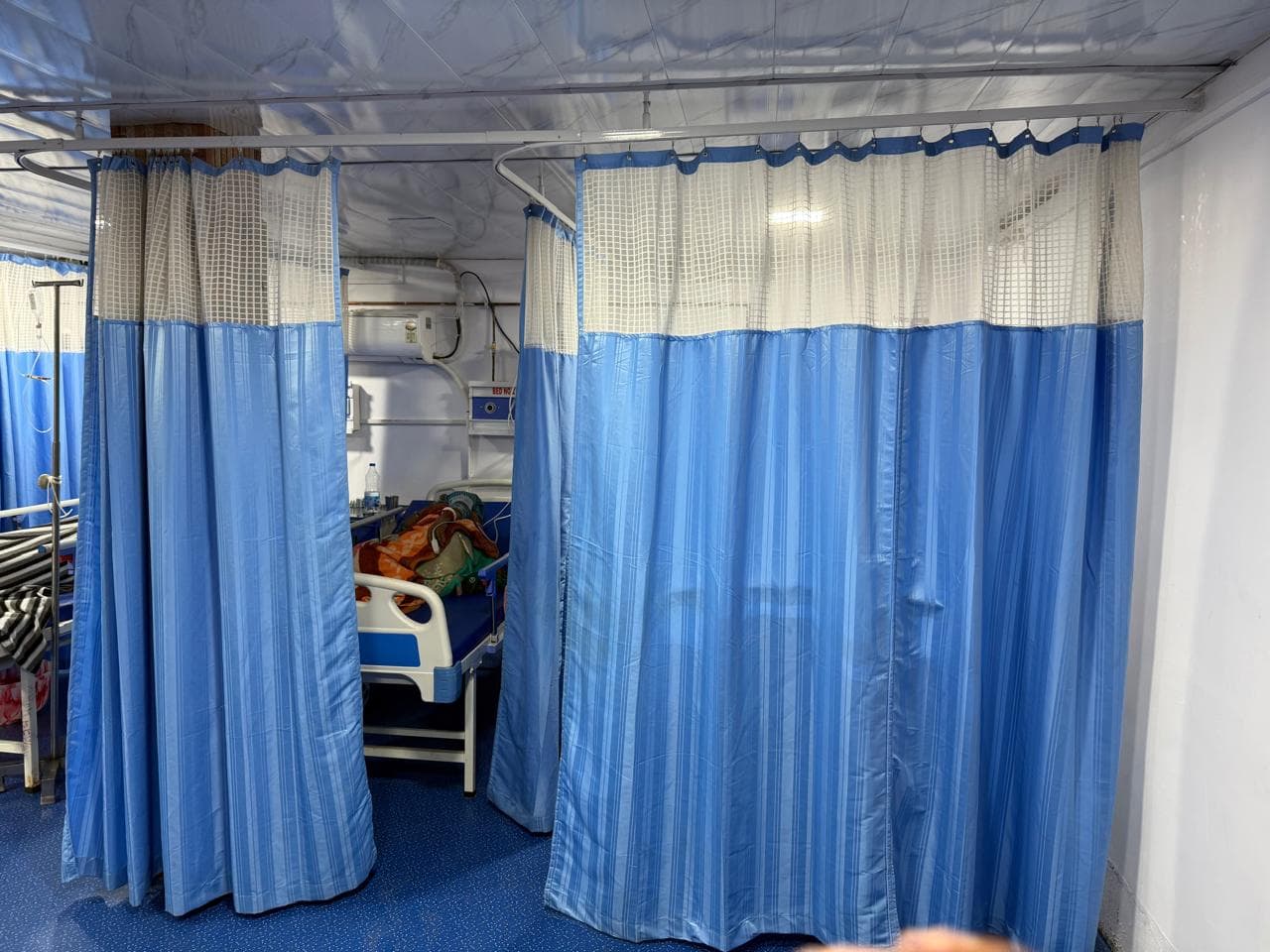 Clean General Ward with Privacy Curtains at Jamui Hospital